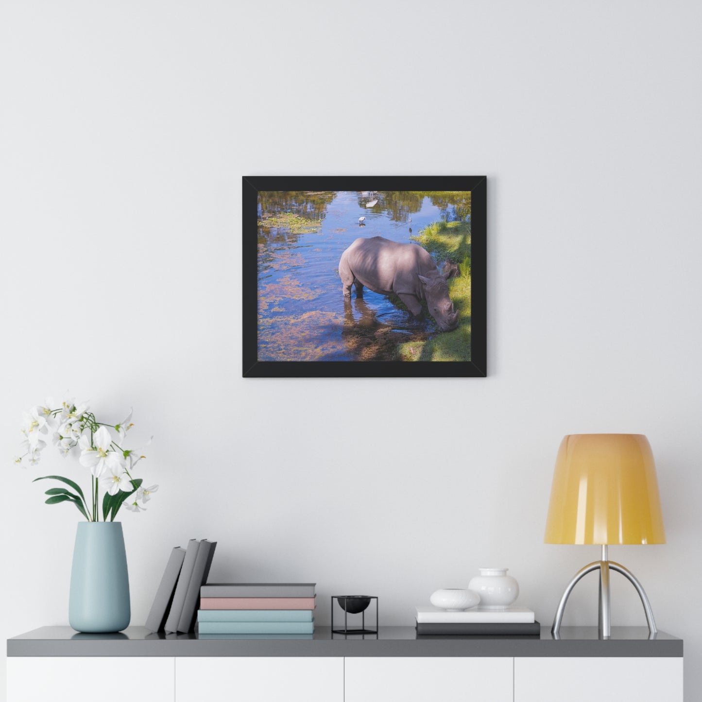 Majestic Presence: A Rhino by the Water - Framed Photography Print