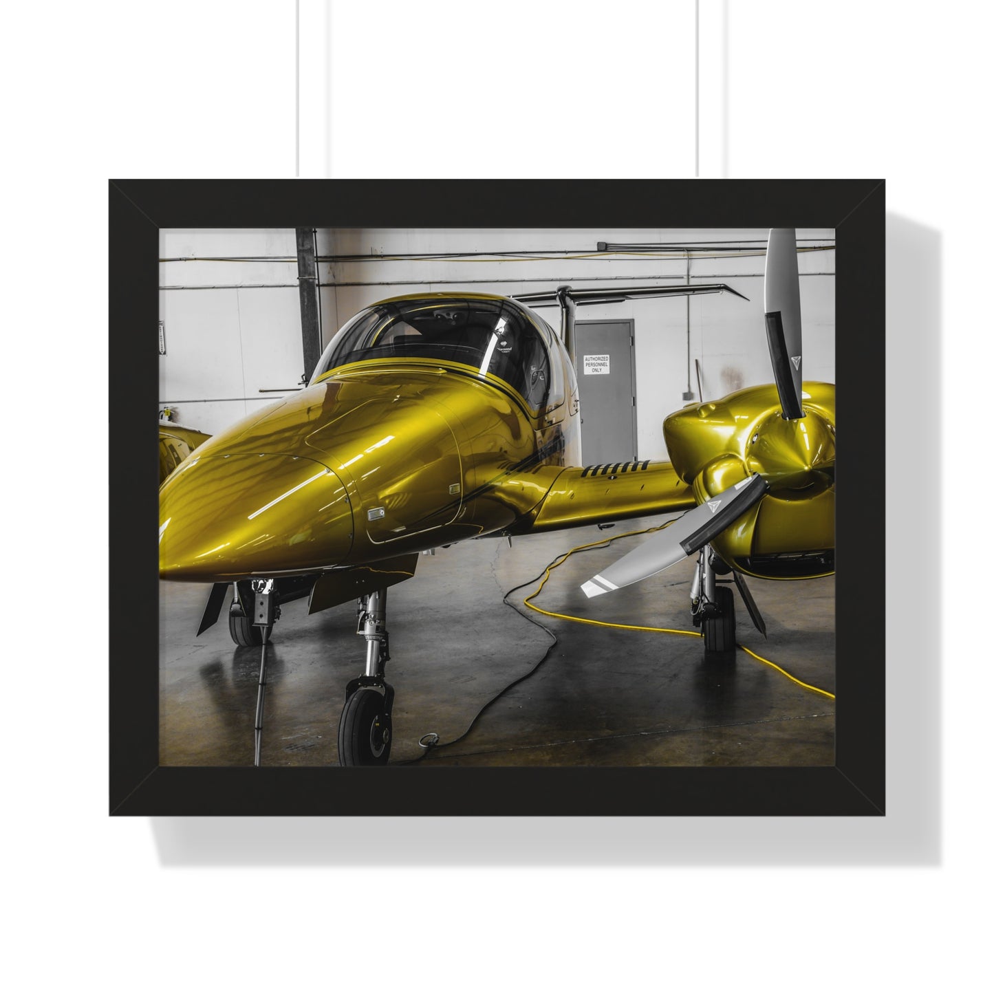 Golden Glory: Airplane in the Hangar - Framed Photography Print