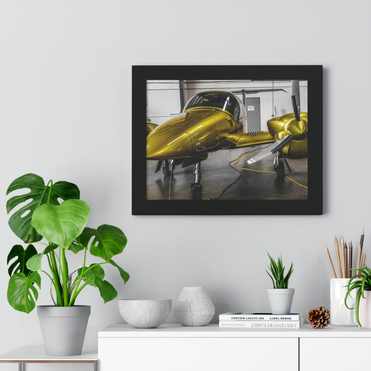 Golden Glory: Airplane in the Hangar - Framed Photography Print