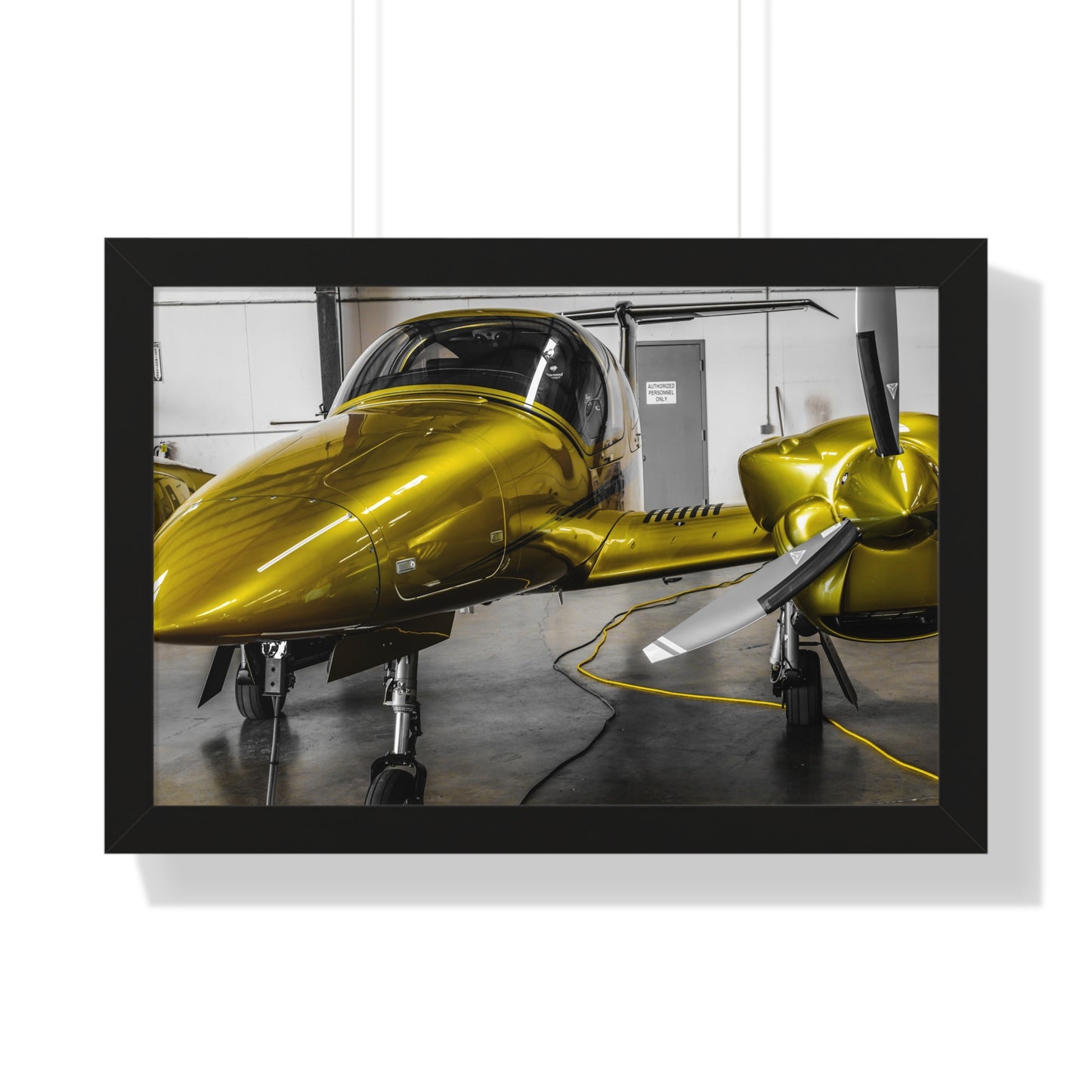 Golden Glory: Airplane in the Hangar - Framed Photography Print