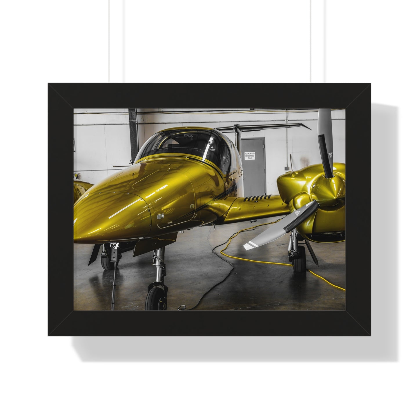 Golden Glory: Airplane in the Hangar - Framed Photography Print