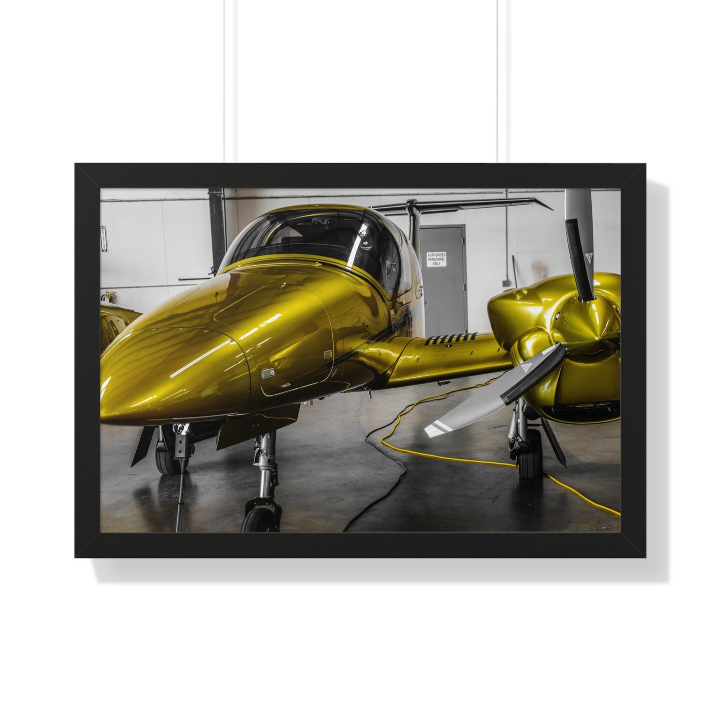 Golden Glory: Airplane in the Hangar - Framed Photography Print